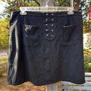 Cato Black Mini Skirt size 18 with Grommet  2 pockets Zips and Buttons in back.